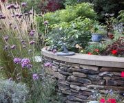 Here we brought stone from the Yorkshire Dales to London to build the dry stone walls for designer Ian Kitson's amazing garden.