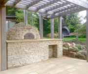 A large pizza oven set in a stunning Surrey garden. We loved building this for Bowles and Wyre, one of London's most prominent garden design and builders.