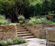 We provided the stone and craftsmanship for the walls and steps in this gorgeous garden by designer Tom Hoblyn at Richmond Park London.
