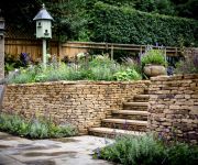 We provided the stone and craftsmanship for the walls and steps in this gorgeous garden by designer Tom Hoblyn at Richmond Park London.