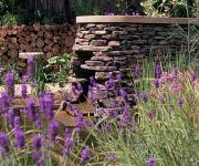 Here we brought stone from the Yorkshire Dales to London to build the dry stone walls for designer Ian Kitson's amazing garden.