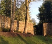 Dry-stone walls to a beautiful and private vicarage garden. One of our more monumental works.