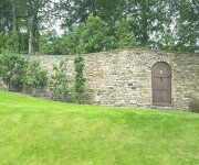 Dry-stone walls to a beautiful and private vicarage garden. One of our more monumental works.