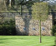 Here we have built dry-stone walls as feature elements to a swimming pool and pond in a garden at Richmond London.