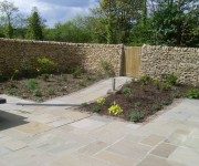 Our dry-stone walls providing security to a lovely house and garden at High Burton.