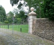Dry-stone walls and pillars to a house in the village of Honley.