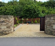 Examples of our beautiful dry-stone walls providing privacy and security to houses and estates.