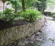 Our waterfall and streamside stonework at the aptly named Thunder Bridge.