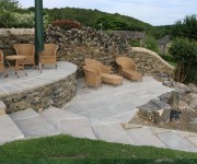 Terraced walling, paving and rockery making a stage for our small tree motif. A lovely place to relax. Where did that dog come from?